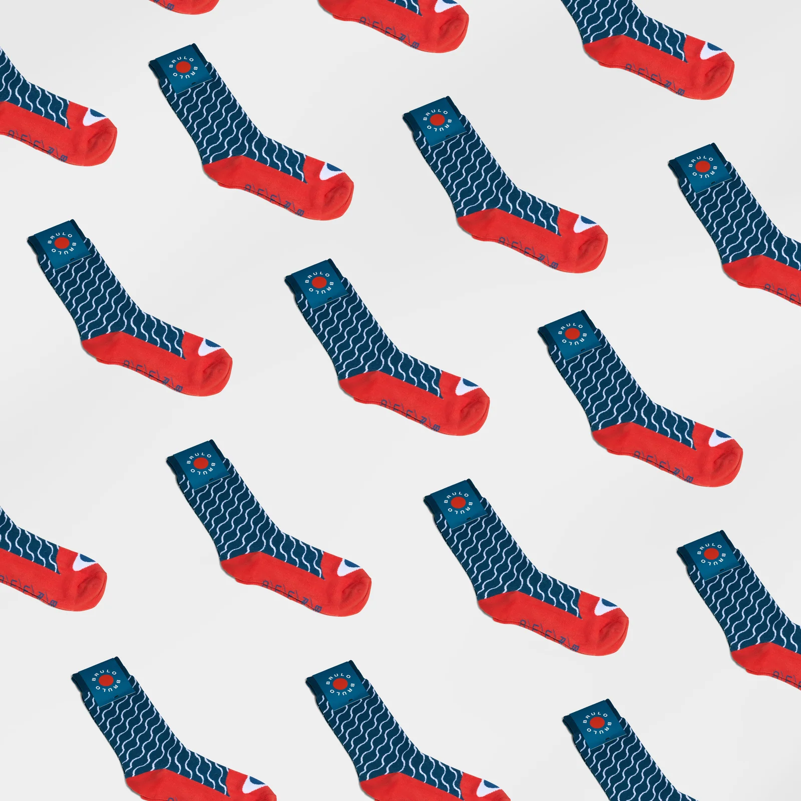 Blue Brülo socks with red heels and toes arranged in a repeating diagonal pattern on white.