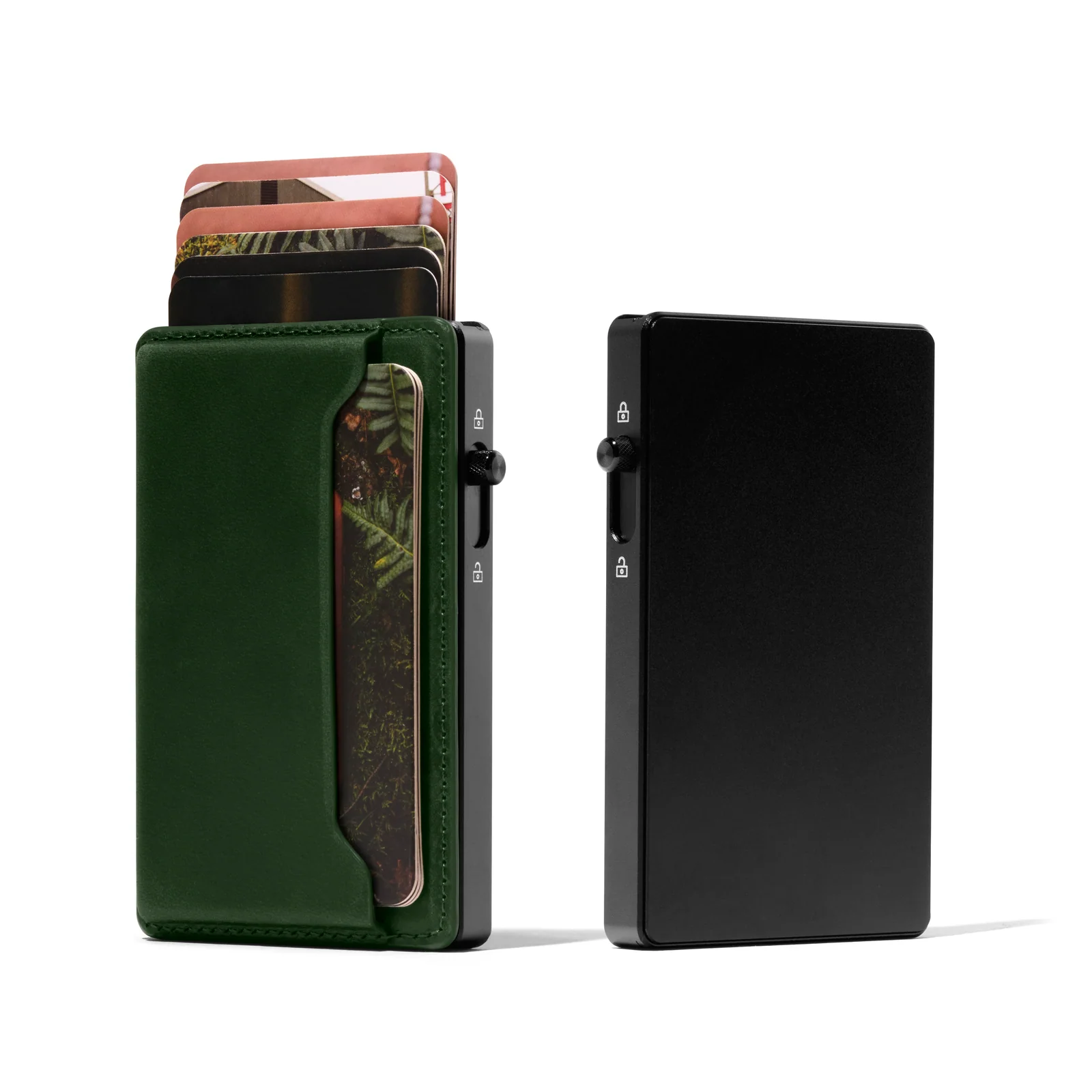 Green leather and black Double Oak cardholders with raised cards on a white background.
