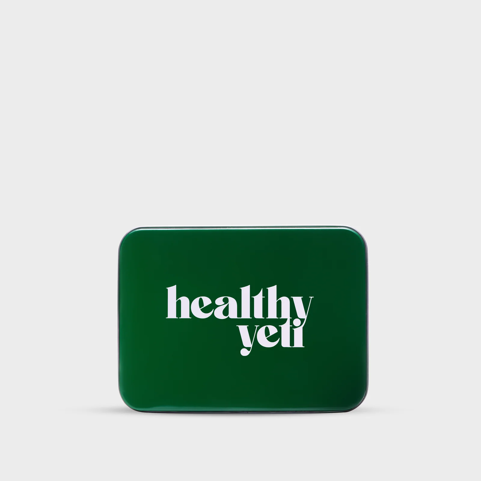Closed green Healthy Yeti tin shown from the front on a light background.