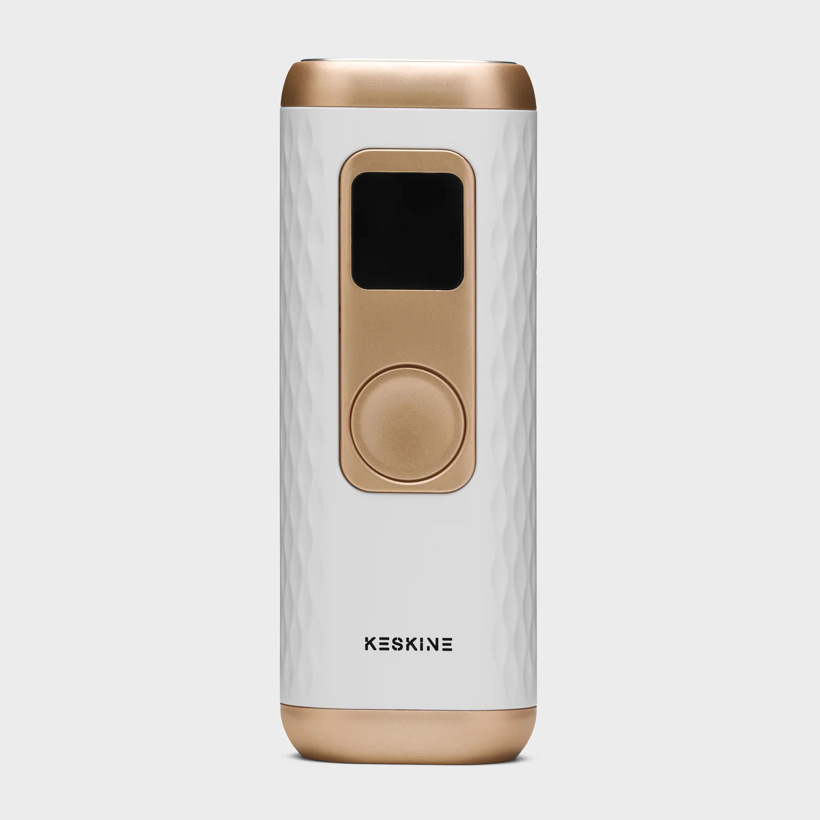 Front view of a white and gold Keskine IPL hair-removal device against white.