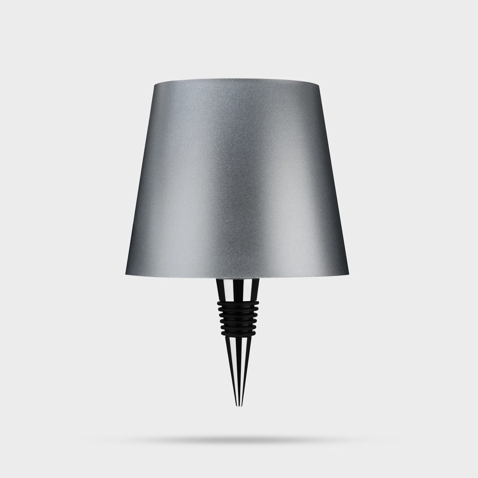 Silver Liquor Lit bottle lamp top with its tapered fitting visible against white.