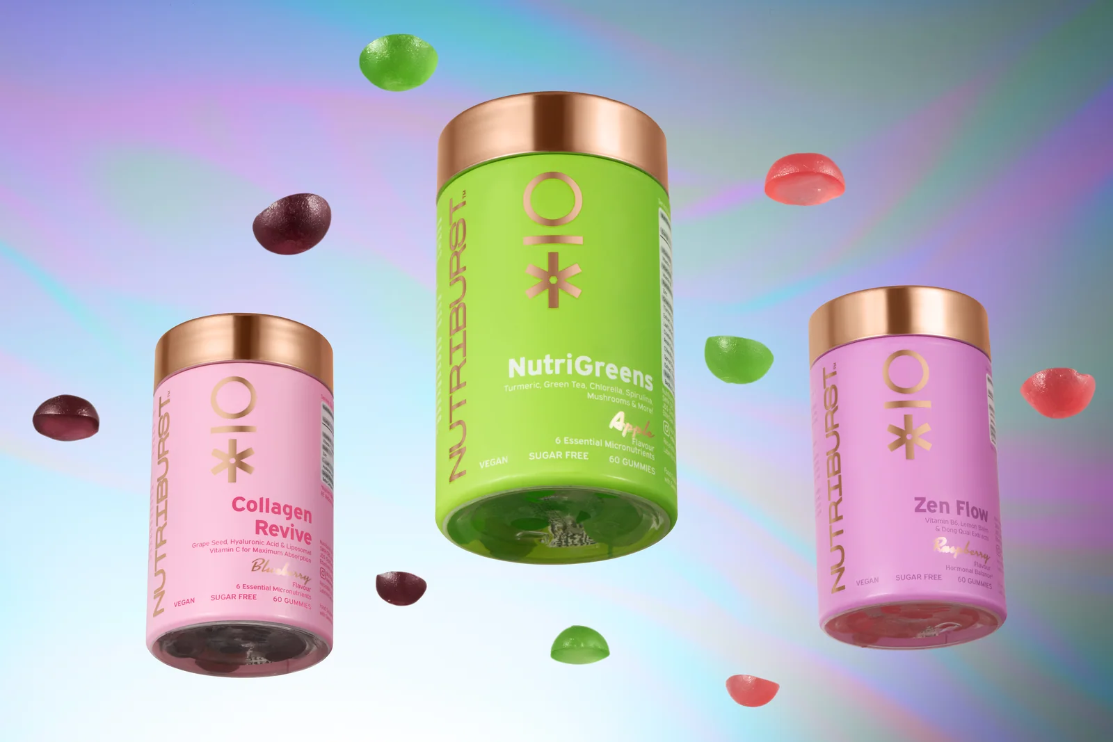 Three pink and green Nutriburst jars with floating gummies against a pastel iridescent background.