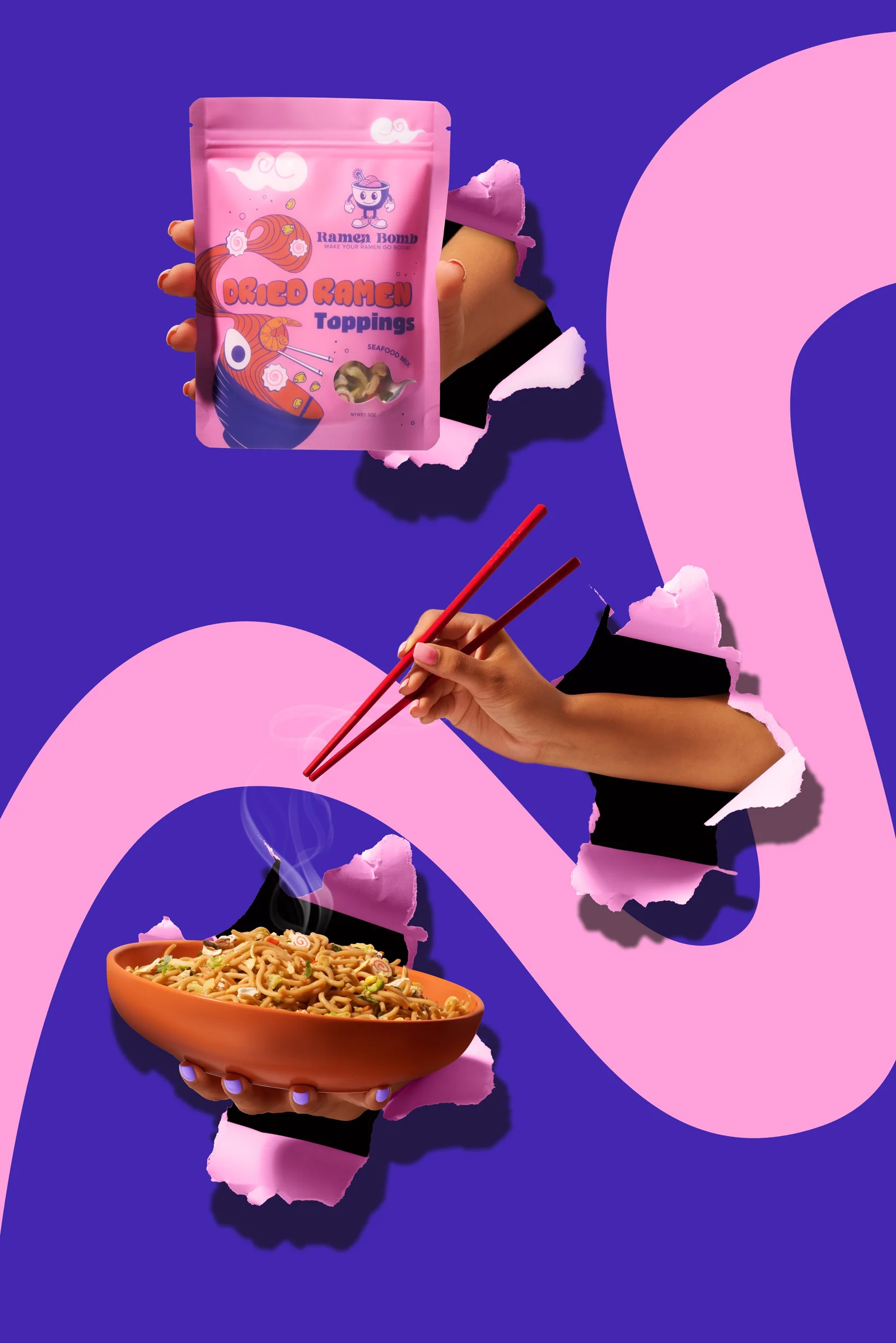 Hands emerging through torn purple paper holding a Ramen Bomb packet, chopsticks and a bowl of noodles.