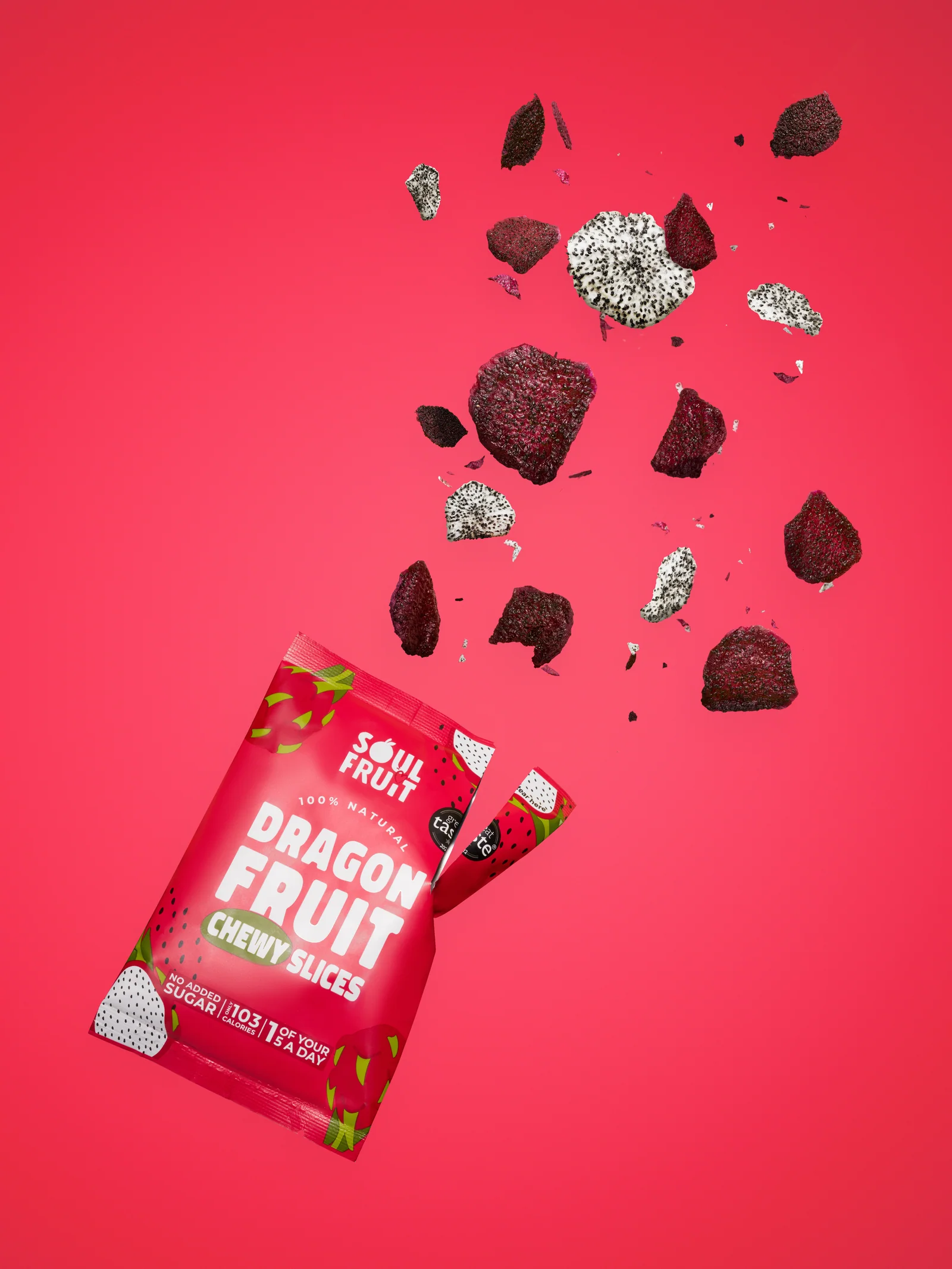 Soul Fruit dragonfruit snack packet with fruit pieces bursting against red.