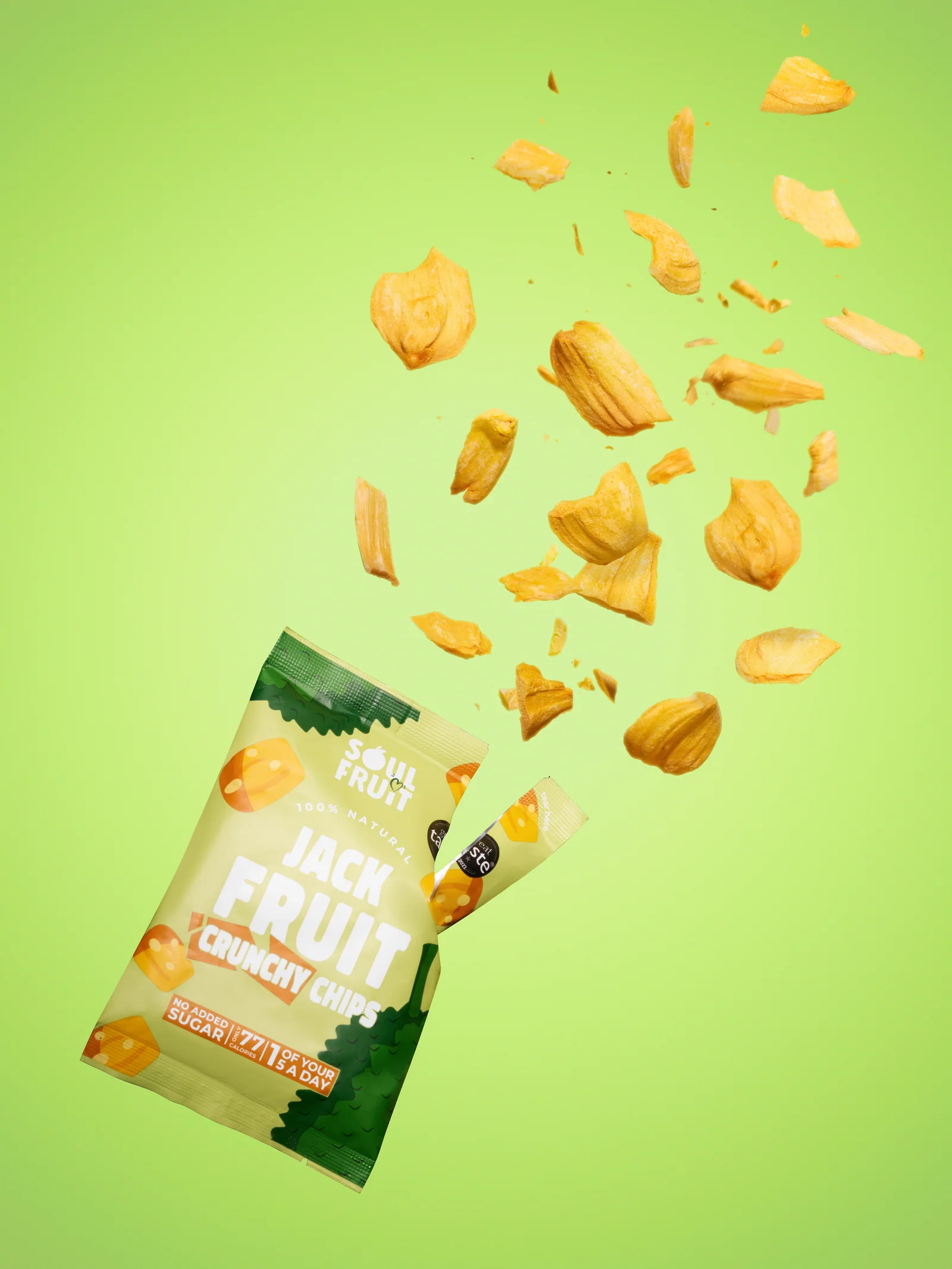 Soul Fruit Jackfruit Crunchy Chips packet with jackfruit pieces bursting out against lime green.