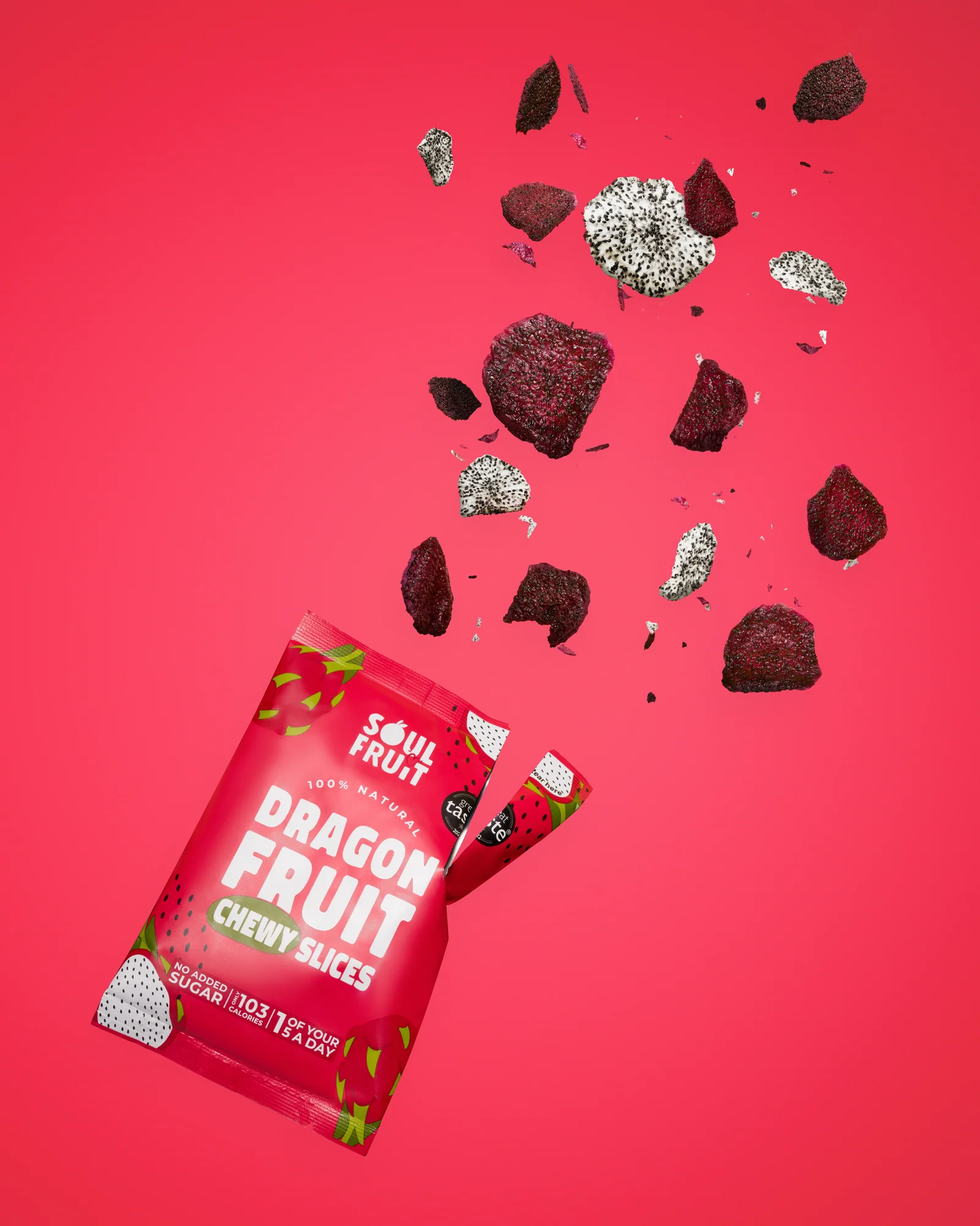 Soul Fruit dragonfruit snack packet with fruit pieces bursting against red.