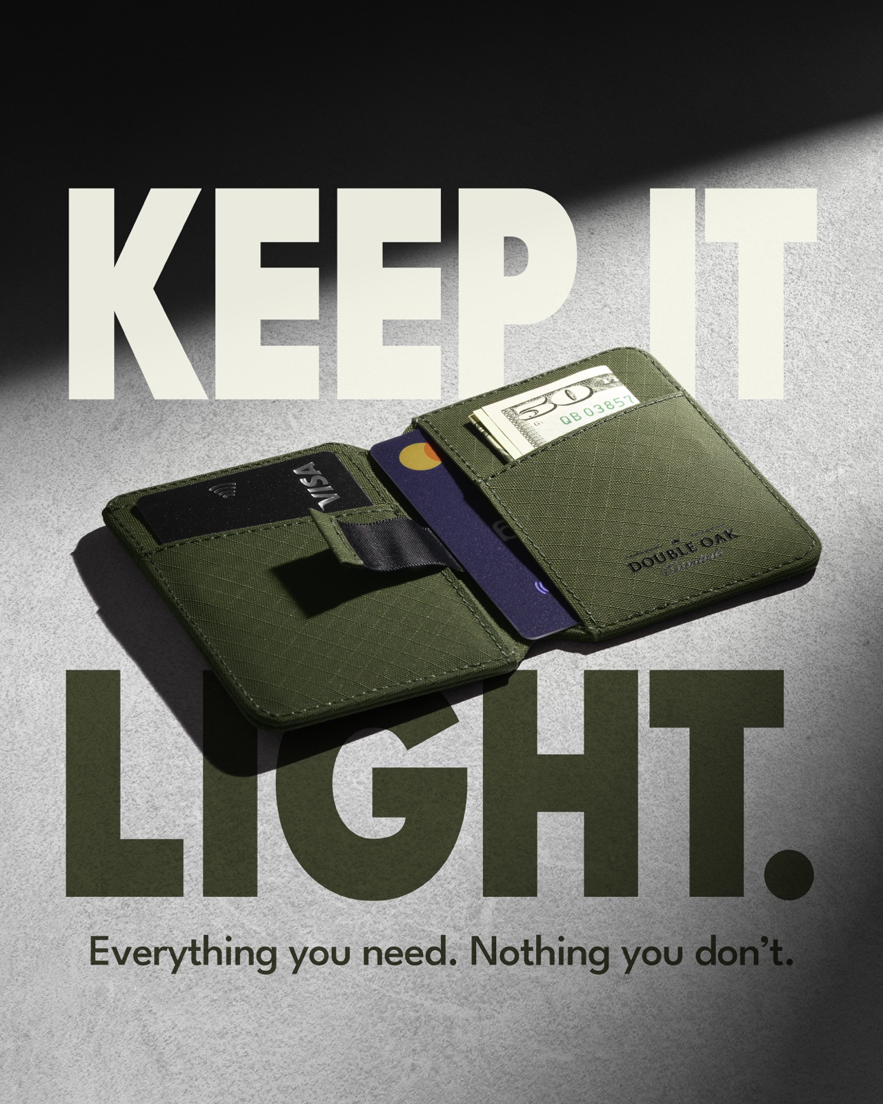 Double Oak moss-green wallet creative with the headline Keep it light.