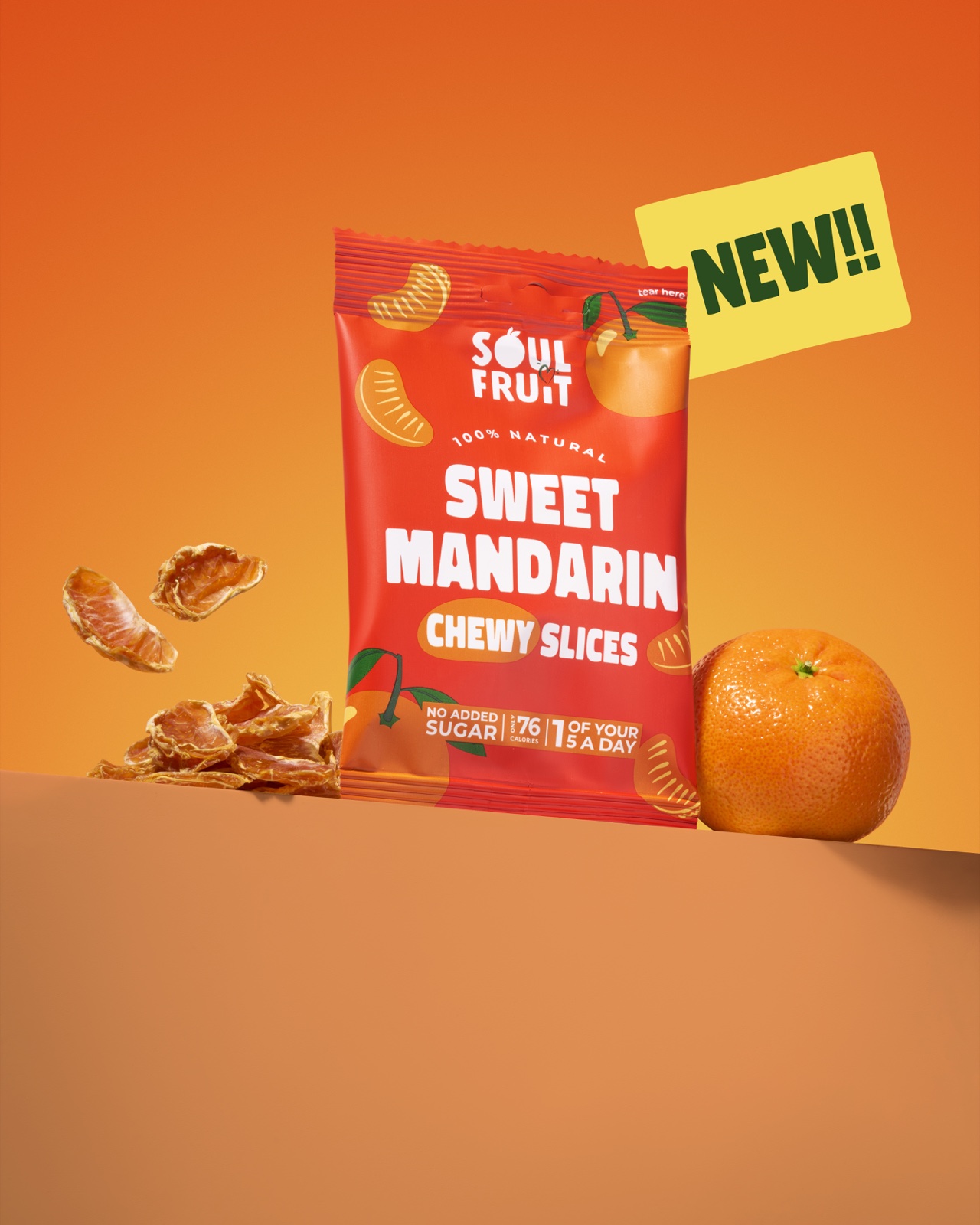 Soul Fruit Sweet Mandarin snack packet with mandarin pieces and a yellow “NEW!” label against an orange background.