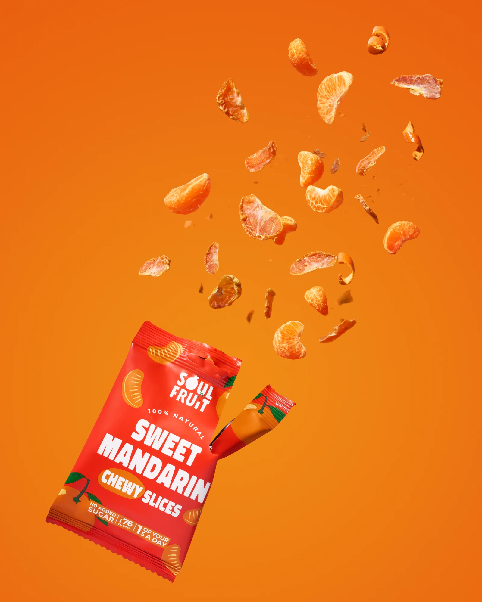 Soul Fruit sweet mandarin snack packet with mandarin pieces suspended on an orange background.